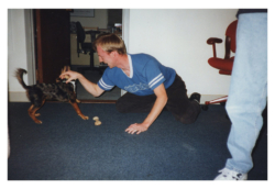 Gus playing rough with Maggie.